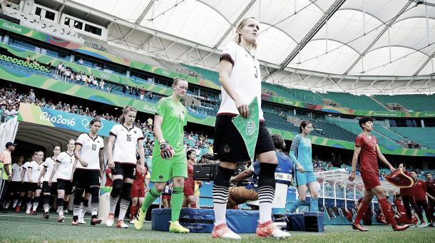 Saskia Bartusiak leads out Germany at the 2016 Olympics in the Quarter-Final against China. Photo: Getty Images