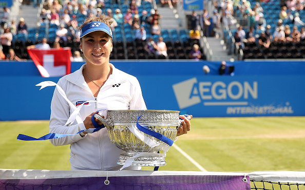 Belinda Bencic poses with her Eastbourne trophy. Photo: Ben Hoskins/Getty Images