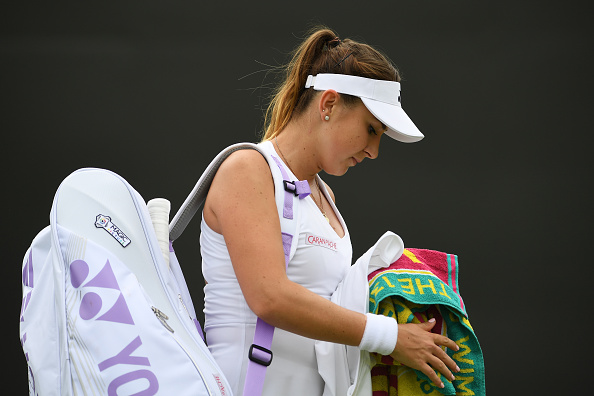 Belinda Bencic was clearly dissapointed at having to retire and exit Wimbledon. Photo: Shaun Botterill/Getty Images