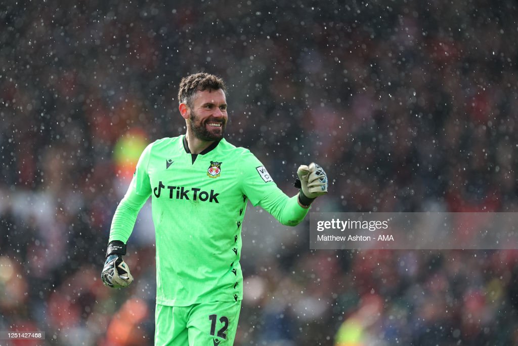 Ben Foster of Wrexham celebrates his side scoring a goal in the rain in the 3-2 victory during the Vanarama National League fixture between Wrexham and <strong><a href='https://www.vavel.com/en/football/2023/03/27/1141978-york-city-vs-scunthorpe-unitednational-league-preview-gameweek-38-2023.html'>Notts County</a></strong> at The Racecourse Ground on April 10, 2023 in Wrexham, Wales. (Photo by Matthew Ashton - AMA/Getty Images)