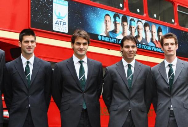 the Big Four stand outside one of the famed London double-decker buses/Getty