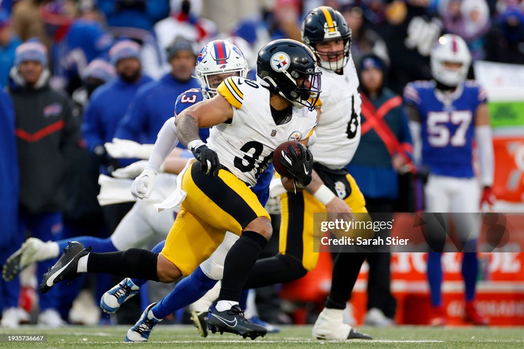 Jaylen Warren #30 of the Pittsburgh Steelers carries the ball against the Buffalo Bills during the first quarter at Highmark Stadium on January 15, 2024 in Orchard Park, New York. (Photo by Sarah Stier/Getty Images)