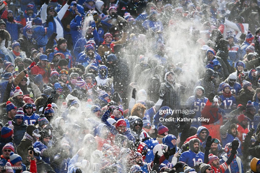 Buffalo Bills fans celebrate after a touchdown during the first half of the NFL wild-card playoff football game against the Pittsburgh Steelers at Highmark Stadium on January 15, 2024 in Orchard Park, New York. (Photo by Kathryn Riley/Getty Images)