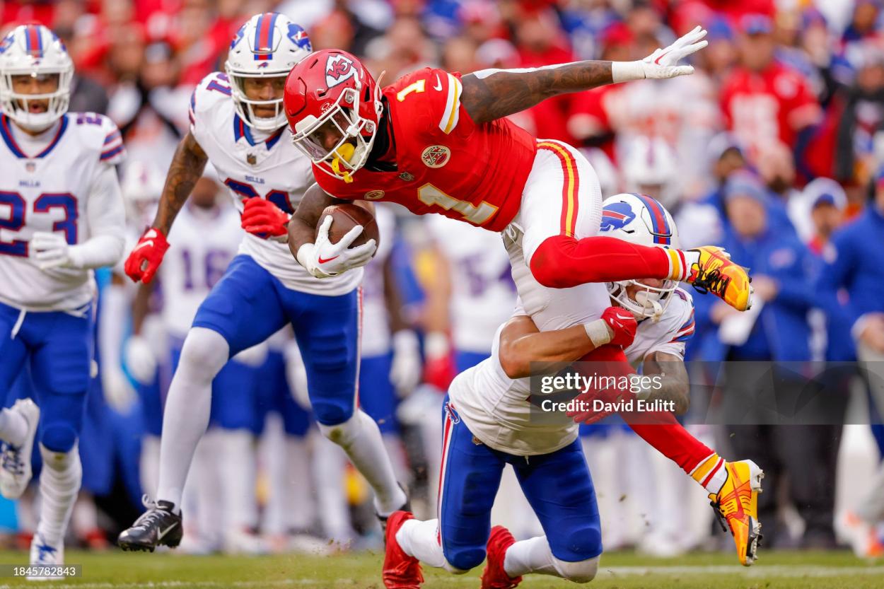 <strong><a  data-cke-saved-href='https://www.vavel.com/en-us/nfl/2023/09/24/1157130-nfl-kansas-city-chiefs-continue-to-shake-it-off-with-win-over-the-chicago-bears.html' href='https://www.vavel.com/en-us/nfl/2023/09/24/1157130-nfl-kansas-city-chiefs-continue-to-shake-it-off-with-win-over-the-chicago-bears.html'>Jerick McKinnon</a></strong> #1 of the Kansas City Chiefs is tackled by Taron Johnson #7 of the Buffalo Bills during the first half of the game at GEHA Field at Arrowhead Stadium on December 10, 2023 in Kansas City, Missouri. (Photo by David Eulitt/Getty Images)