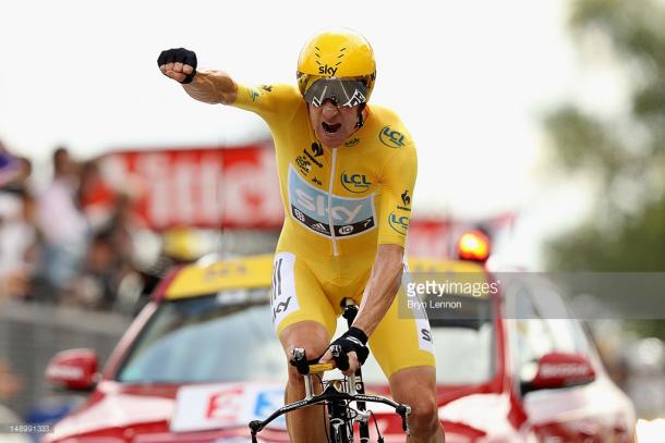 Bradley Wiggins punches the air with delight as he celebrates winning the stage and securing the yellow jersey during stage 19 of the 2012 Tour de France. | Photo: Bryn Lennon/Getty Images