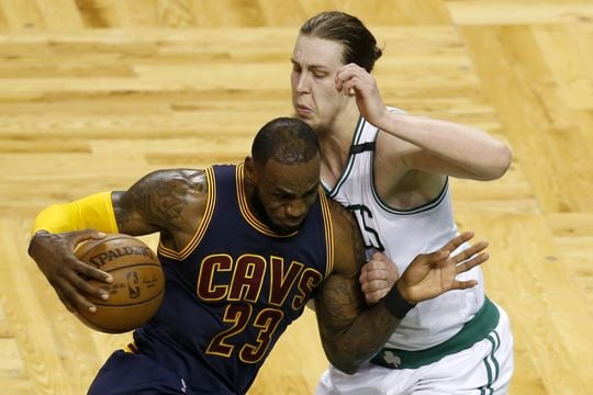 Cleveland Cavaliers forward LeBron James (23) drives towards Boston Celtics center Kelly Olynyk (41). Photo:Greg M. Cooper-USA TODAY Sports  