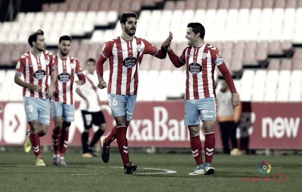Jugadores del Lugo celebrando un gol | Fotografía: La Liga