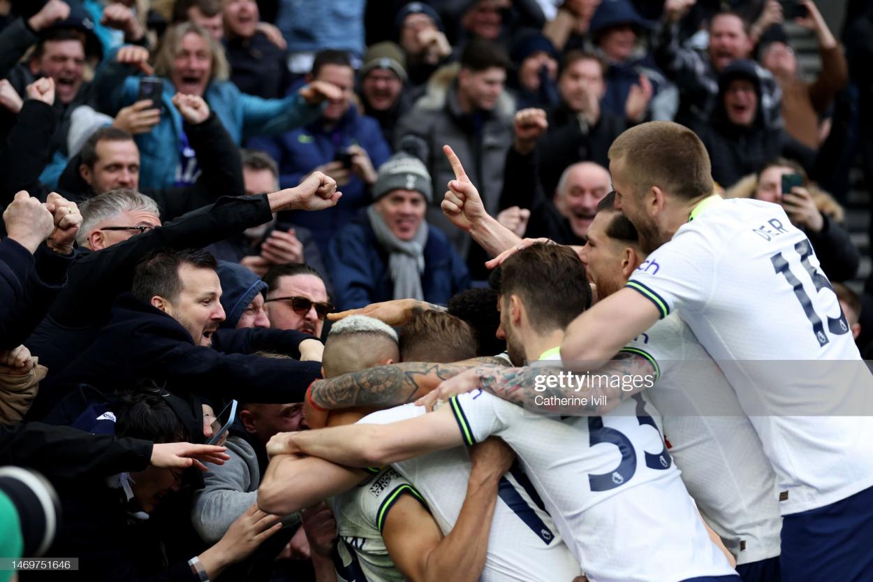 Oliver Skipp and the Tottenham squad celebrate with the fans after his impressive goal. (Photo by Catherine Ivill/Getty Images)