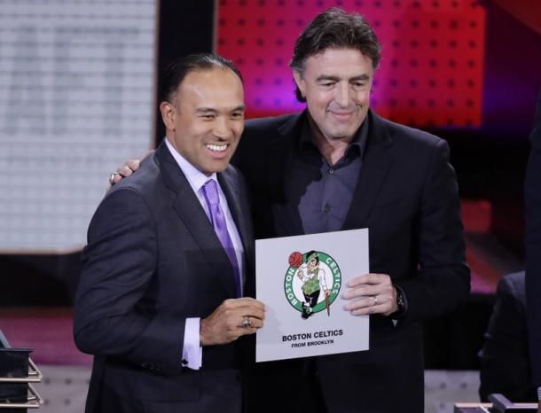 NBA Deputy Commissioner Mark Tatum (left) with Celtics co-owner Wyc Grousbeck (right) at Tuesday's draft lottery. Photo: AP Images