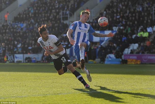Chadli heads in against Colchester (photo: Kevin Quigley)