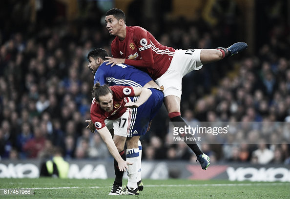 Chris Smalling played through the pain barrier last month against Chelsea Photo: Mike Hewitt/Gettyimages