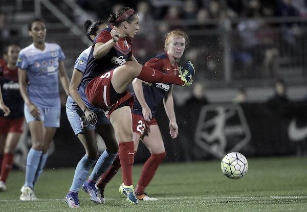 Church attempting to clear the ball as they compete against Sky Blue FC. Photo: Washington Spirit