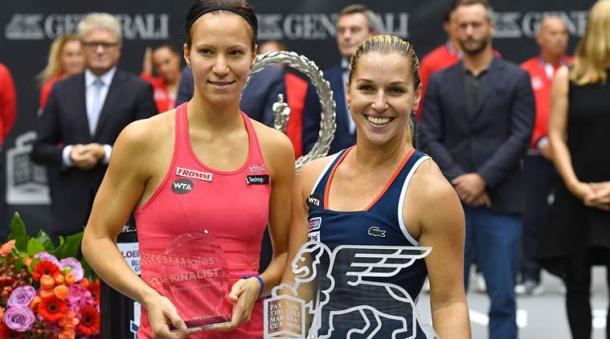 Cibulkova and finalist Viktorija Golubic (left) and their trophies after the conclusion of the final in Linz. Photo credit: Associated Press.