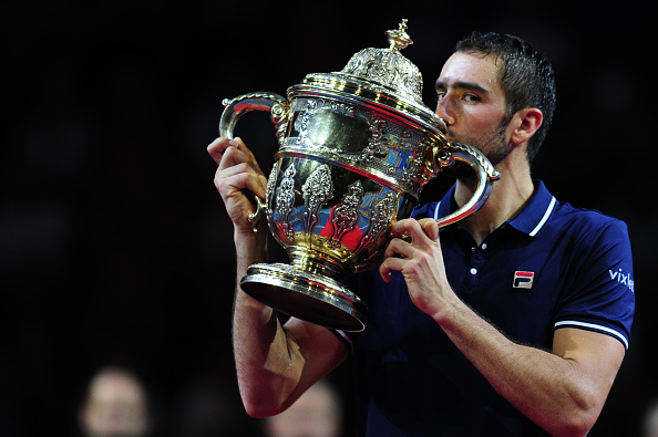 Cilic kissing his maiden ATP 500 title in Basel last week (Photo by Fabrice Coffrini / Getty Images)