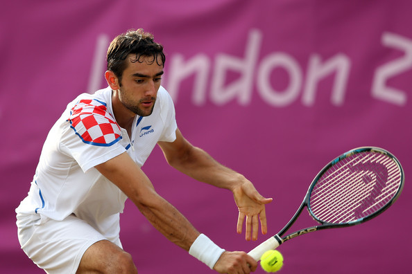 Cilic competing in the second round of the London Olympics in 2012 against Hewitt (Photo by Clive Brunskill / Source : Getty Images)