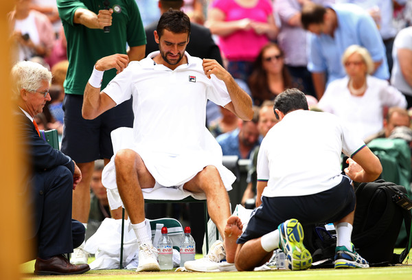 Cilic received a medical timeout on the blister on his foot which was causing him discomfort (Photo by Clive Brunskill / Getty)