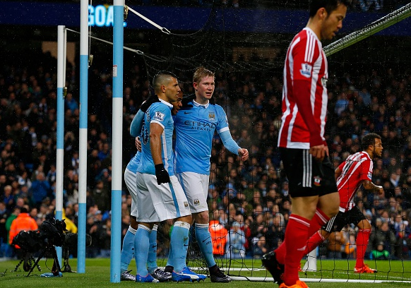 de Bruyne's opener was the result of a defensive mishap, courtesy of Maya Yoshida (right)