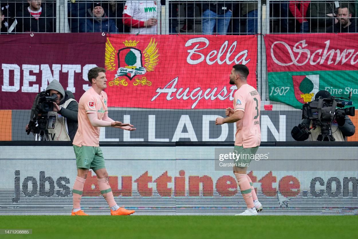 Jens Stage and Anthony Jung celebrate goal against Augsburg (Photo by Carsten Harz/Getty Images)