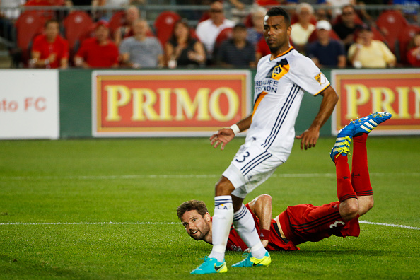 Ashley Cole watches as Drew Moor scores winning goal. | Photo: odd Korol/Toronto Star via Getty Images