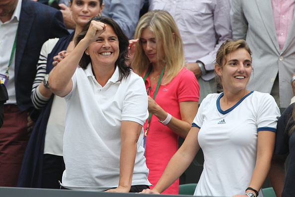 Martinez (left) was playing every point by point with Muguruza at Wimbledon in the coaching box (Photo by Tim Clayton / Corbis)