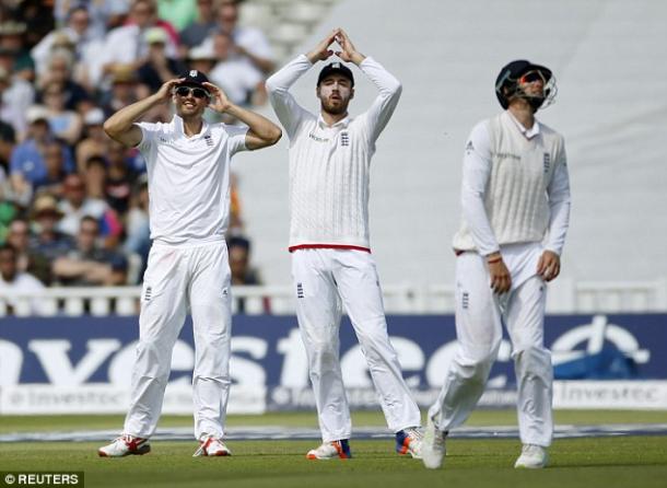 Cook and Vince agonise over a chance going astray (photo: Reuters)