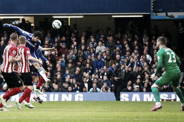 Costa plants a header past Forster in a one-all draw in March 2015 | Photo: Reuters
