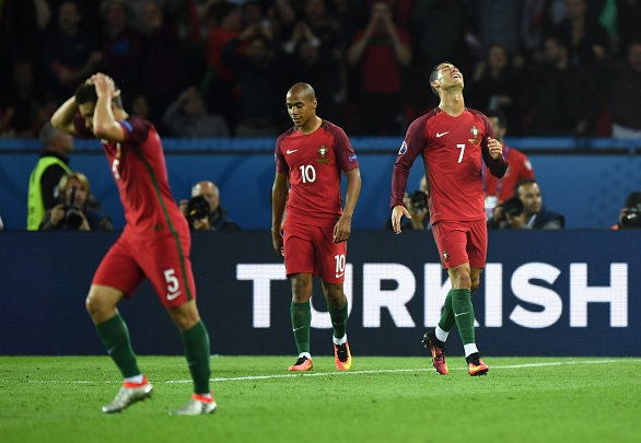 Cristiano (far right) has struggled to live up to expectations thus far, and Portugal have looked stifled. | Photo: Getty