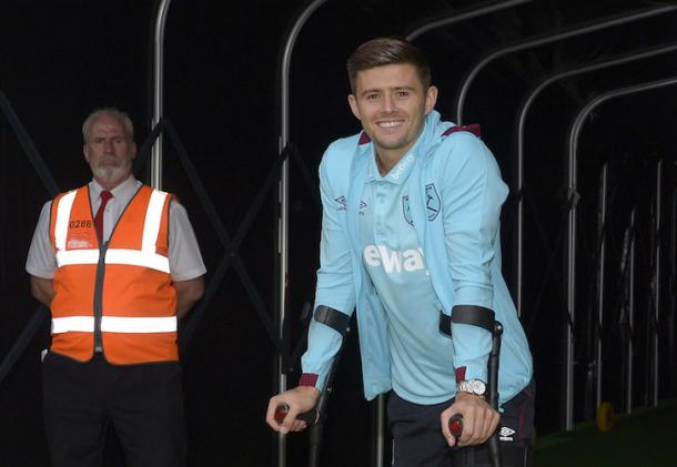 West Ham United full-back Aaron Cresswell on crutches after a knee ligament injury | Photo: whufc.com