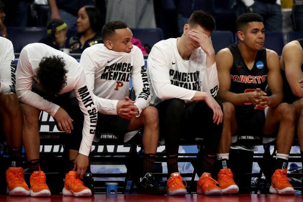 The Princeton bench looks on dejectedly after Cannady's miss/Photo: Elsa/Getty Images
