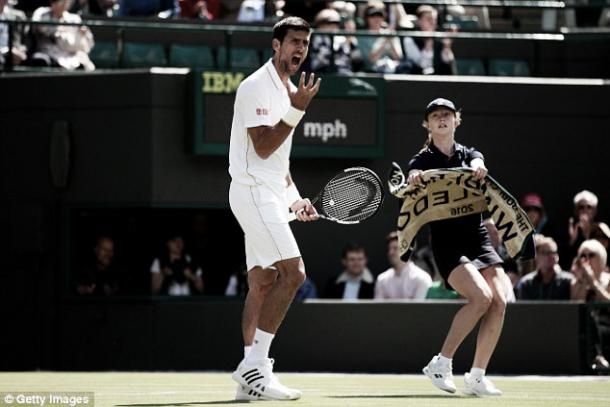 Above: Novak Djokovic frustrated in his 3-1 defeat to Sam Querrey | Photo: Getty Images 