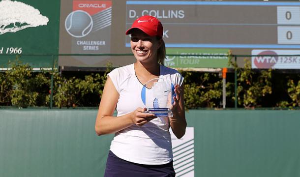 Danielle Collins posing alongside the biggest title of her career in Newport Beach | Photo: Oracle Challenger Series