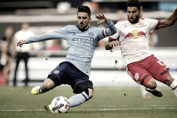 Sal Zizzo helps his keeper handle David Villa. | Photo: Noah K. Murray