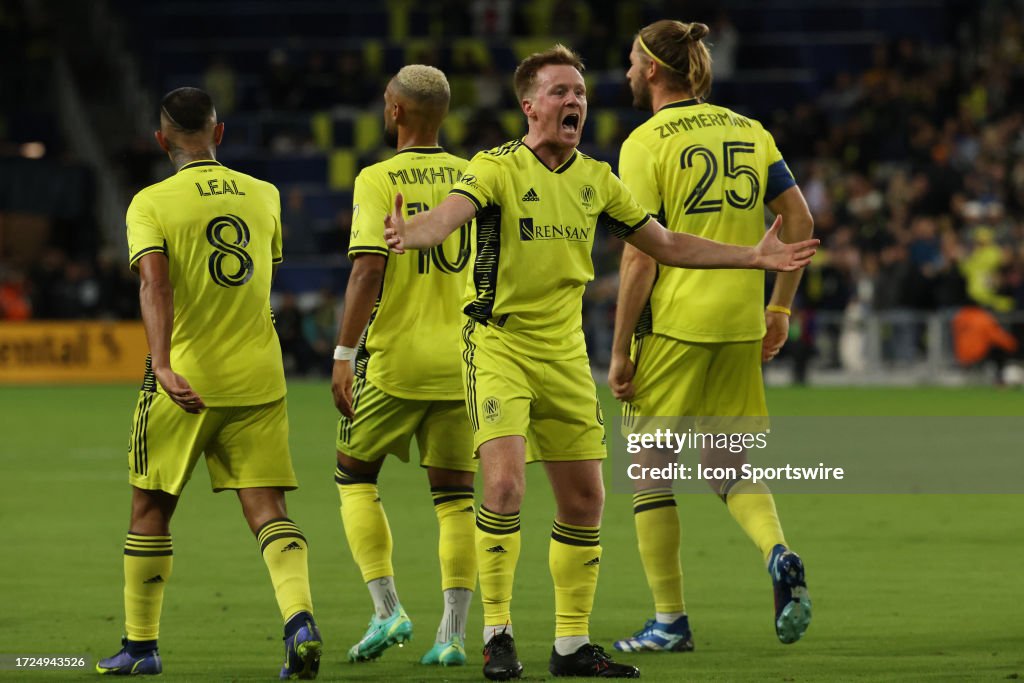 <strong><a  data-cke-saved-href='https://www.vavel.com/en-us/soccer/2023/06/22/mls/1149679-bryce-duke-cf-montreal-snap-nashville-unbeaten-streak.html' href='https://www.vavel.com/en-us/soccer/2023/06/22/mls/1149679-bryce-duke-cf-montreal-snap-nashville-unbeaten-streak.html'>Nashville SC</a></strong> midfielder Dax McCarty (6) yells to the crowd after scoring a goal during a match between <strong><a  data-cke-saved-href='https://www.vavel.com/en-us/soccer/2023/06/22/mls/1149679-bryce-duke-cf-montreal-snap-nashville-unbeaten-streak.html' href='https://www.vavel.com/en-us/soccer/2023/06/22/mls/1149679-bryce-duke-cf-montreal-snap-nashville-unbeaten-streak.html'>Nashville SC</a></strong> and New <strong><a  data-cke-saved-href='https://www.vavel.com/en-us/soccer/2023/10/04/mls/1158169-new-england-revolution-vs-columbus-crew-preview-how-to-watch-team-news-predicted-lineups-kickoff-time-and-ones-to-watch.html' href='https://www.vavel.com/en-us/soccer/2023/10/04/mls/1158169-new-england-revolution-vs-columbus-crew-preview-how-to-watch-team-news-predicted-lineups-kickoff-time-and-ones-to-watch.html'>England Revolution</a></strong>, October 14, 2023, at GEODIS Park in Nashville, Tennessee. (Photo by Matthew Maxey/Icon Sportswire via Getty Images)