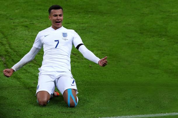 Dele Alli celebrates his spectacular goal on debut against France in November. Source: The Sun