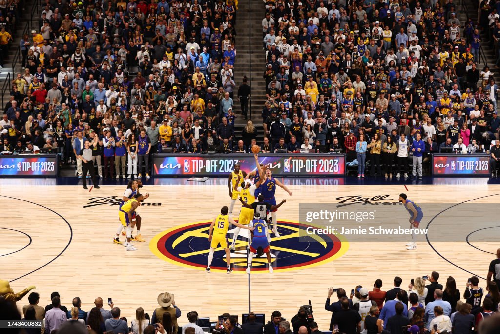 The opening tipoff before the game between the Los Angeles Lakers and the Denver Nuggets on October 24, 2023 at the Ball Arena in Denver, Colorado. Copyright 2023 NBAE (Photo by Jamie Schwaberow/NBAE via Getty Images)