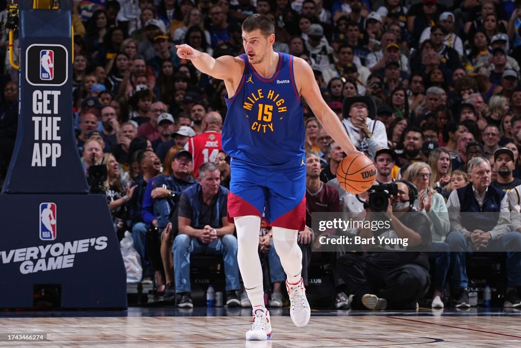 Nikola Jokic #15 of the Denver Nuggets dribbles the ball during the game against the Los Angeles Lakers on October 24, 2023 at the Ball Arena in Denver, Colorado. Copyright 2023 NBAE (Photo by Bart Young/NBAE via Getty Images)