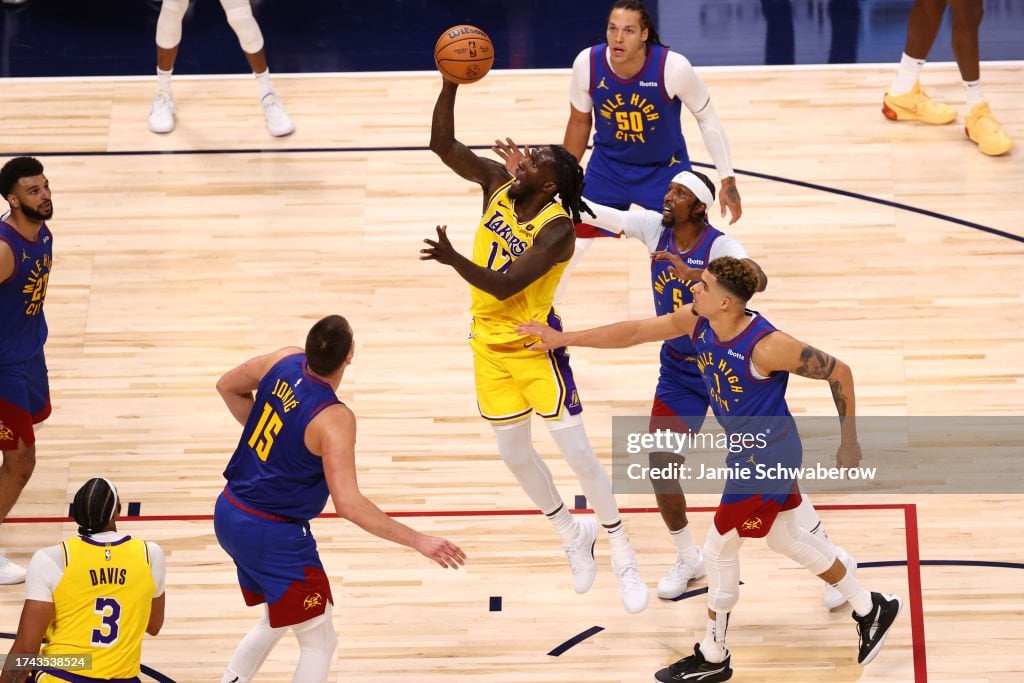 Taurean Prince #12 of the Los Angeles Lakers shoots the ball during the game against the Denver Nuggets on October 24, 2023 at the Ball Arena in Denver, Colorado. Copyright 2023 NBAE (Photo by Jamie Schwaberow/NBAE via Getty Images)