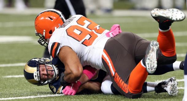 The defensive end gets the sack on the Rams quarterback (Photo: Getty Images)