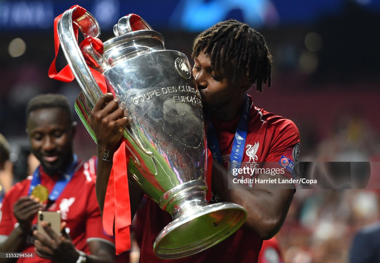 Origi holding the Champions League trophy - (Photo by Harriet Lander/Copa/Getty Images)