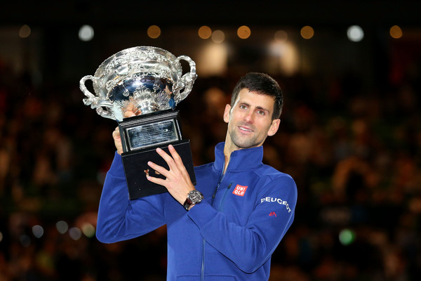 Djokovic posing witth the Norman Brookes Challenge Cup for a record-equalling sixth time after defeating Andy Murray in the final (Photo by Cameron Spencer / Getty Images)