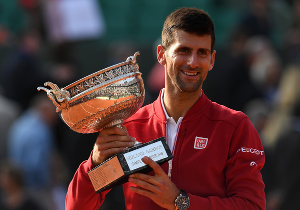 Djokovic holding his first French Open title back in June (Photo by Dennis Grombkowski / Getty Images)