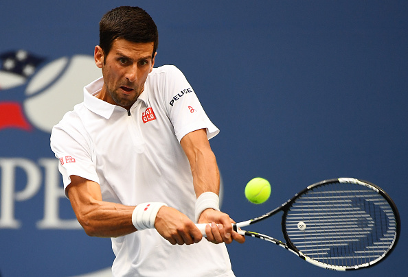 Djokovic in action in the Arthur Ashe Stadium (Photo by Alex Goodlett / Getty Images)