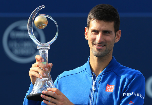 Djokovic holding the Rogers Cup trophy for the fourth time (Photo by Vaughn Ridley / Getty Images)