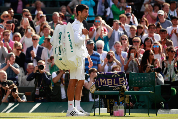 A dejected Djokovic following his shock defeat to Sam Querrey in the third round of Wimbledon (Photo by Adam Pretty / Source : Getty Images)