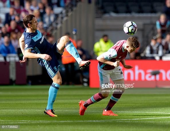 Downing challanges with Sam Byram during Boro's latest away day against West Ham | Photo: Getty