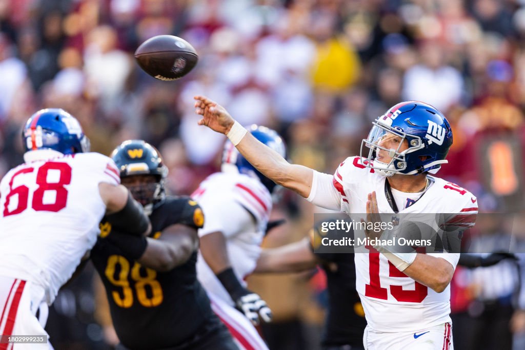 Tommy DeVito #15 of the New York Giants throws a pass during an NFL football game between the Washington Commanders and the New York Giants at FedExField on November 19, 2023 in Landover, Maryland. (Photo by Michael Owens/Getty Images)
