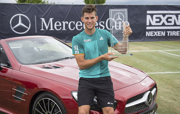 Thiem celebrates his Mercedes Open trophy, having beaten the likes of Federer and Kohlschreiber. | Photo: Getty