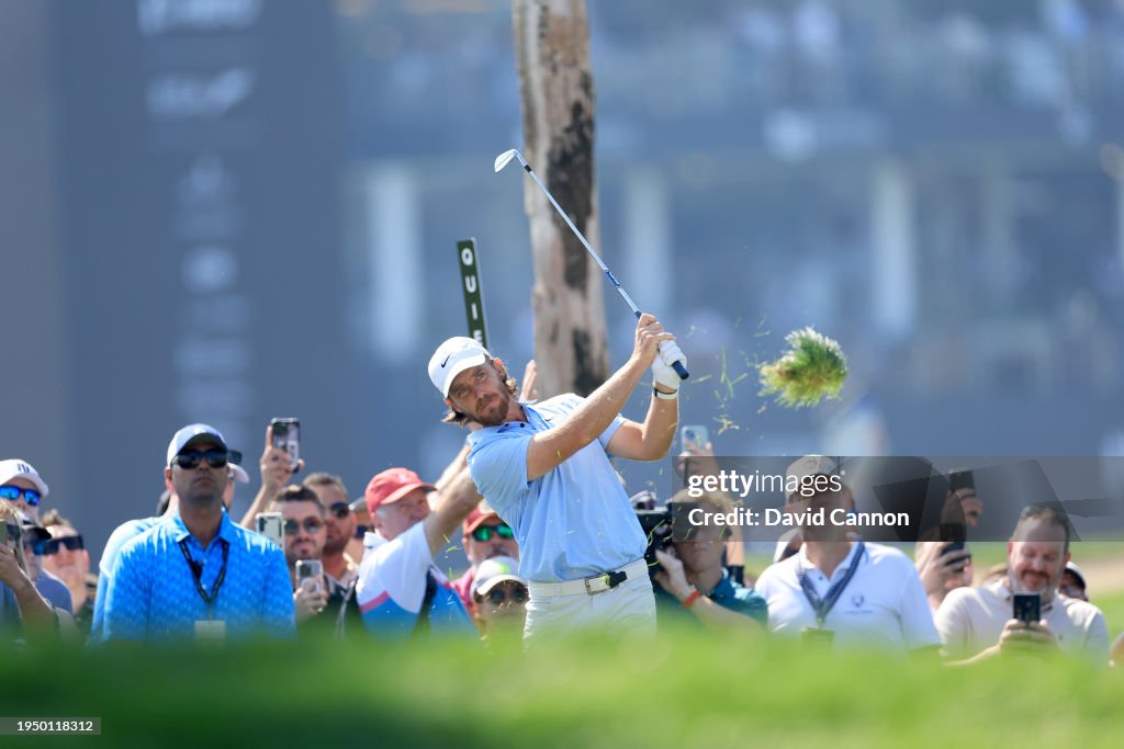 Tommy Fleetwood of England plays his second shot on the first hole during the final round of the Hero Dubai Desert Classic on The Majlis Course at The Emirates Golf Club on January 21, 2024 in Dubai, United Arab Emirates. (Photo by David Cannon/Getty Images)