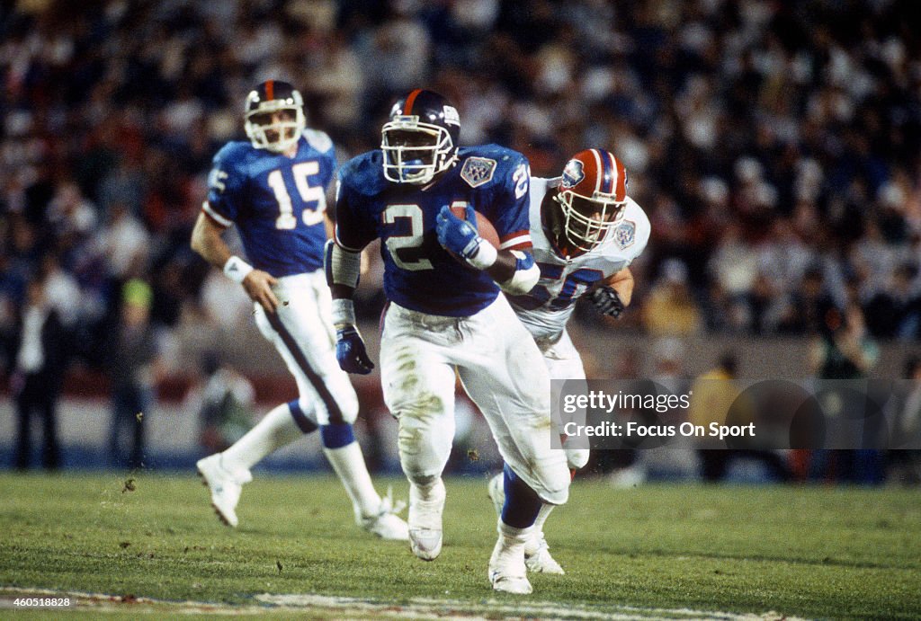 Ottis Anderson #24 of the New York Giants carries the ball against the Buffalo Bills during Super Bowl XXV January 27, 1991 at Tampa Stadium in Tampa, Florida. The Giants won the Super Bowl 20-19. (Photo by Focus on Sport/Getty Images)