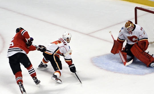 Brian Elliott needs to improve his game with the Calgary Flames. | Photo: USA Today Sports